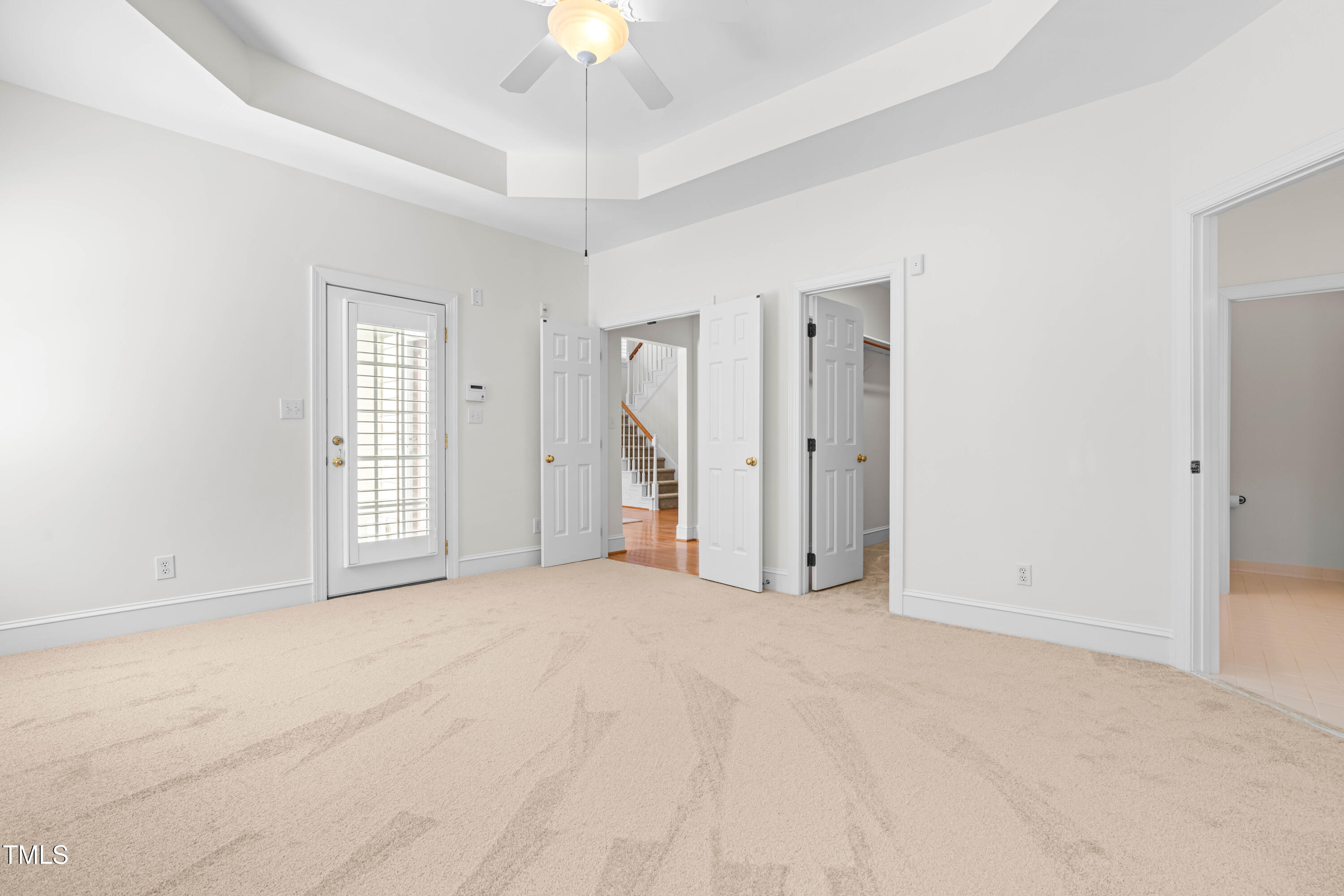 2909 Hawtree Drive Raleigh, NC 27613 - Photo 19 of 38 a view of an empty room with chandelier fan