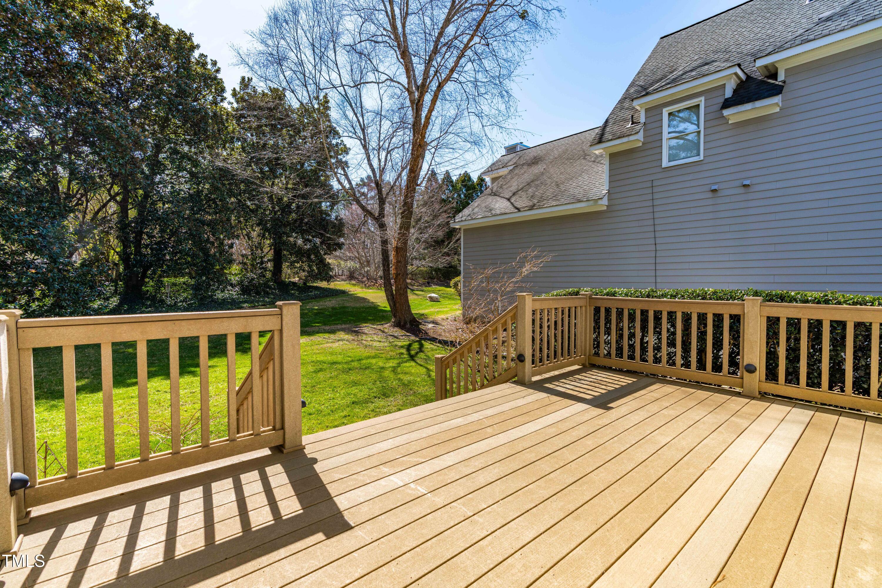 2909 Hawtree Drive Raleigh, NC 27613 - Photo 35 of 38 a view of a wooden deck