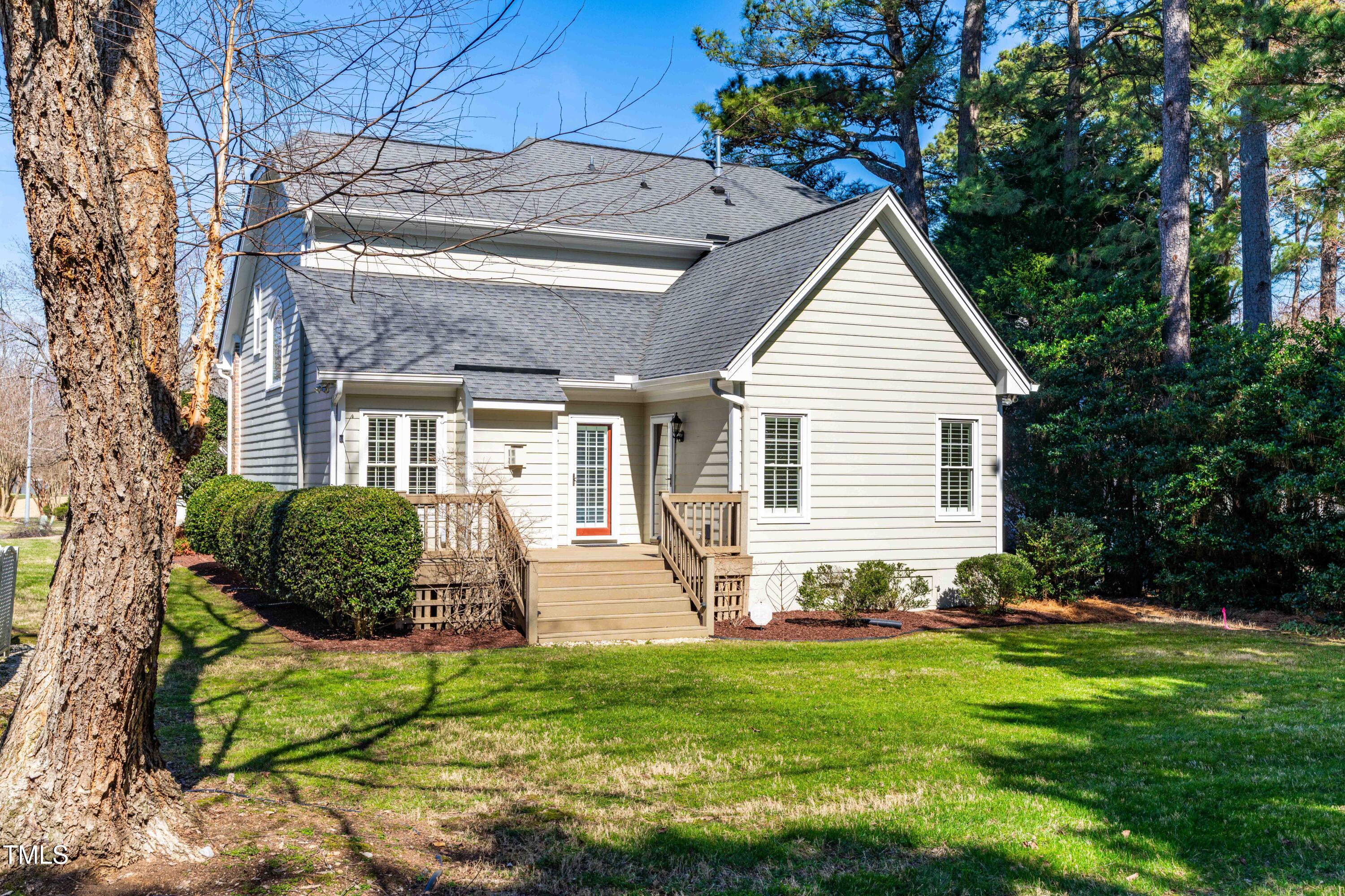 2909 Hawtree Drive Raleigh, NC 27613 - Photo 36 of 38 a house view with a garden and garden