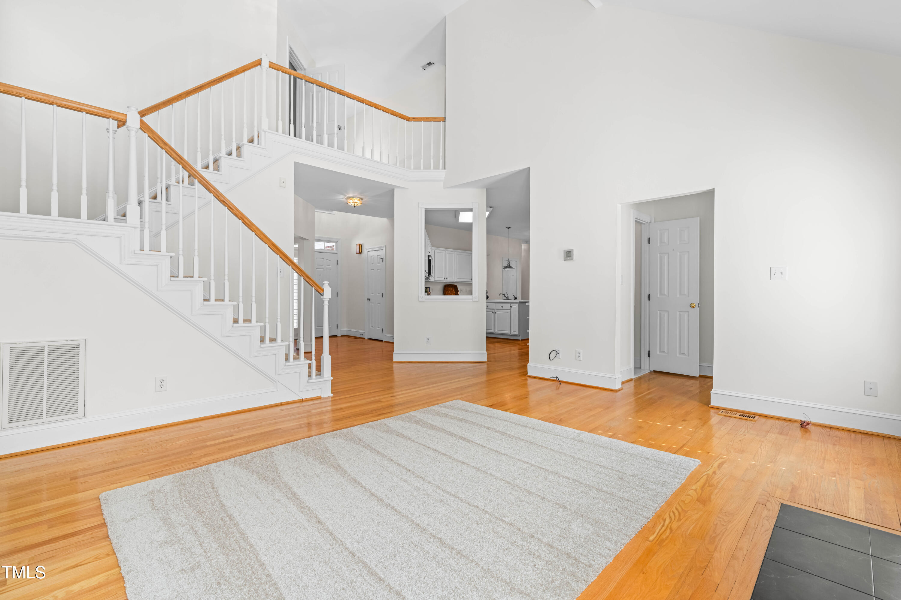 2909 Hawtree Drive Raleigh, NC 27613 - Photo 9 of 38 a view of an entryway with wooden floor