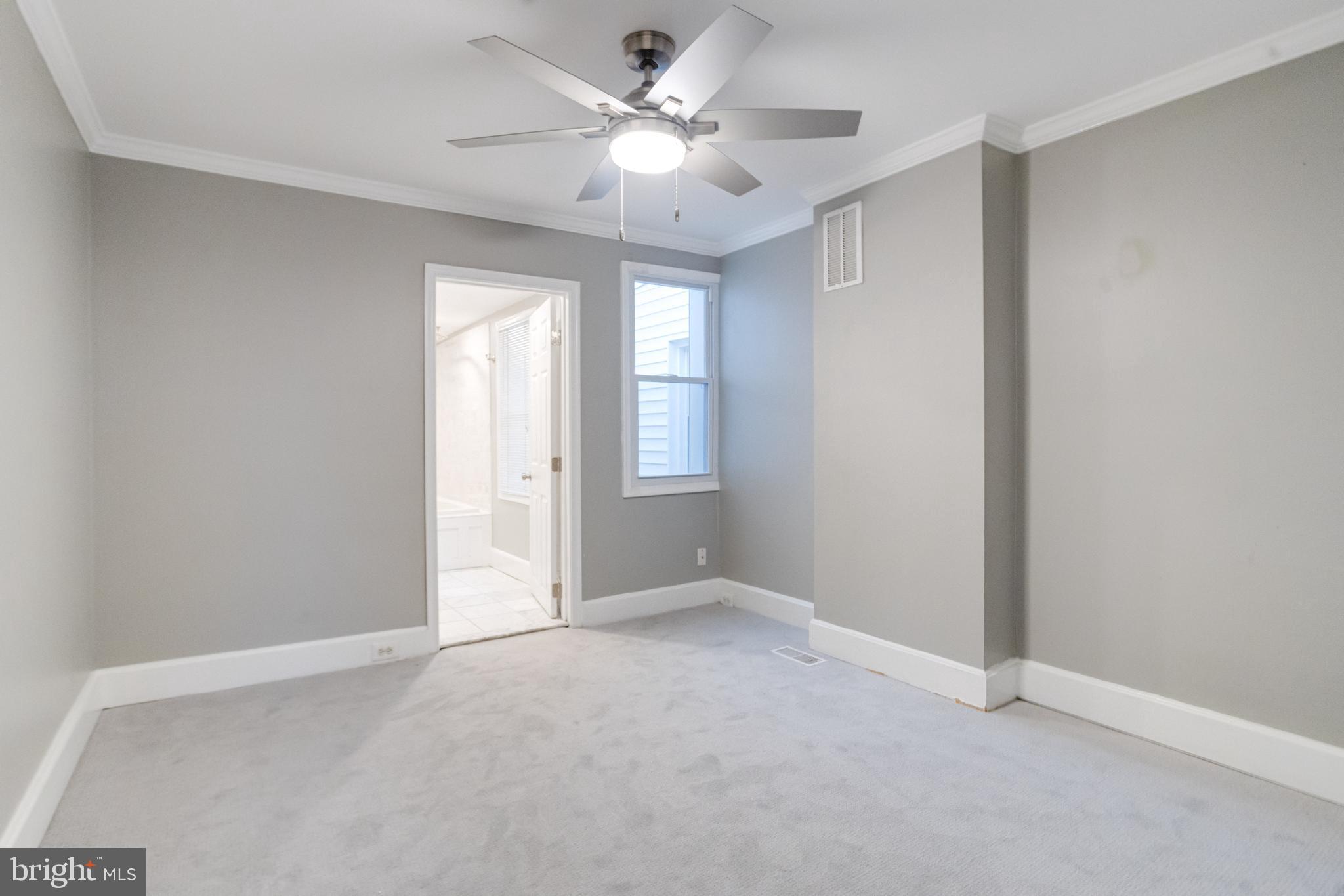 1313 Patapsco Street Baltimore, MD 21230 - Photo 17 of 52 a view of an empty room with a window