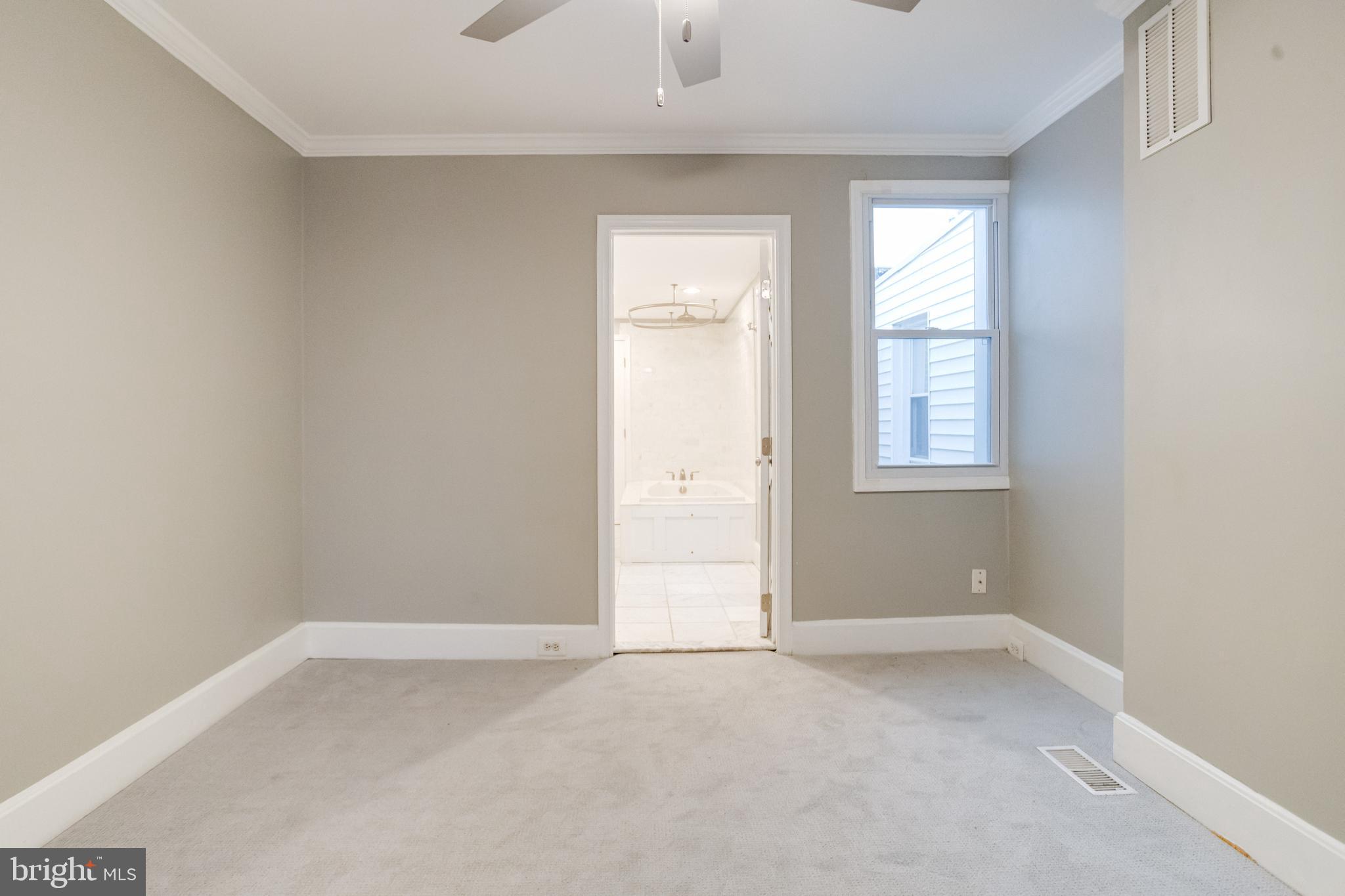 1313 Patapsco Street Baltimore, MD 21230 - Photo 18 of 52 an empty room with windows