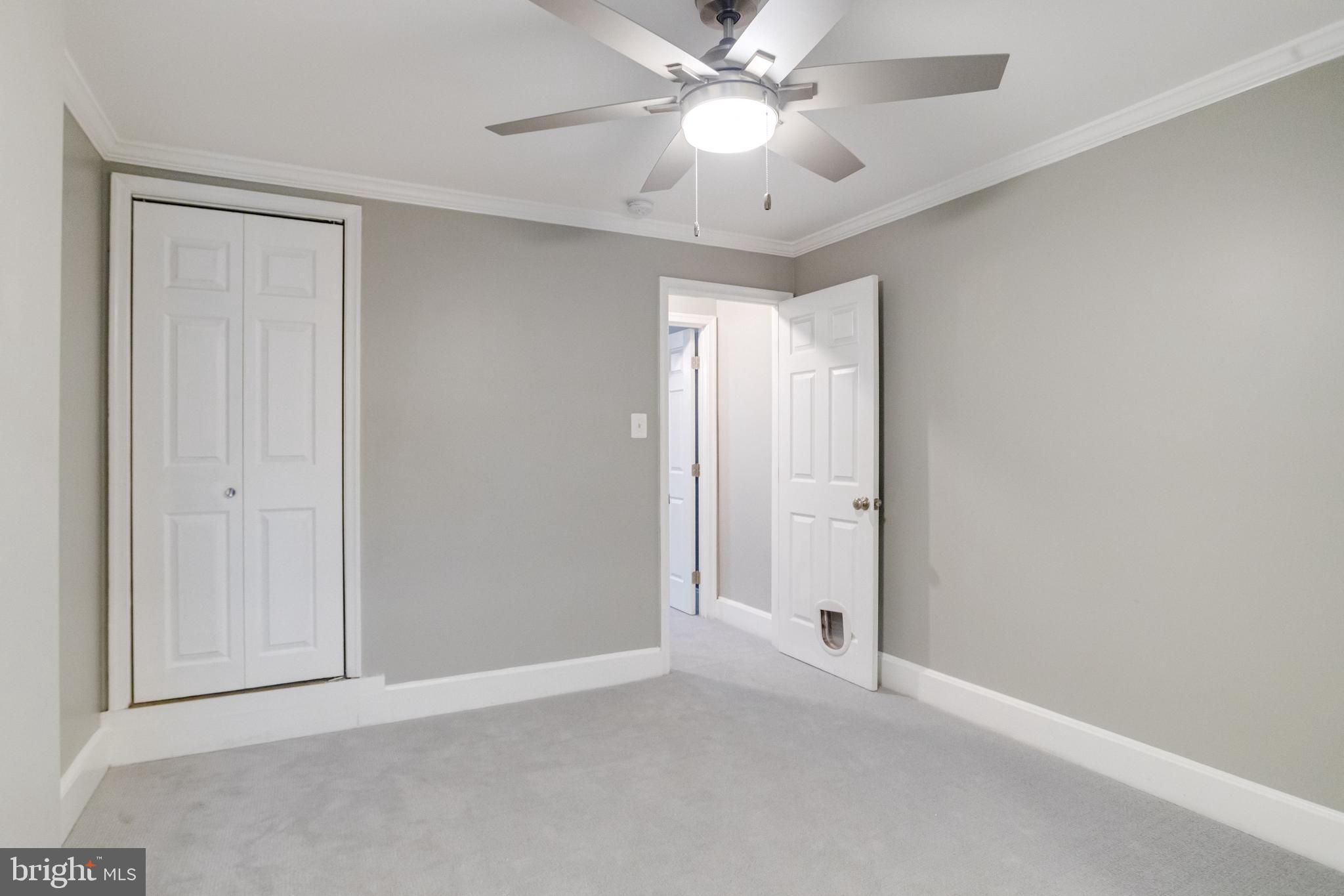 1313 Patapsco Street Baltimore, MD 21230 - Photo 20 of 52 a view of an empty room and chandelier fan