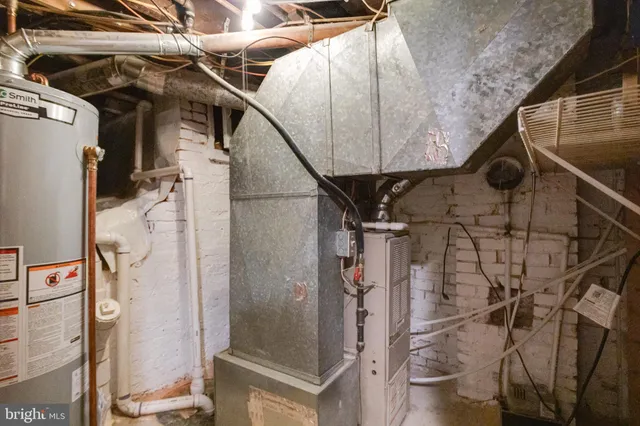 a view of a porch with a door and wooden floor