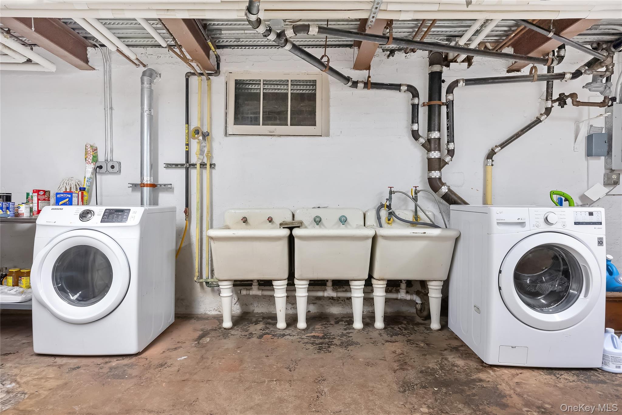 1-27 Beverly Road Queens, NY 11363 - Photo 46 of 46 a utility room with dryer and washer