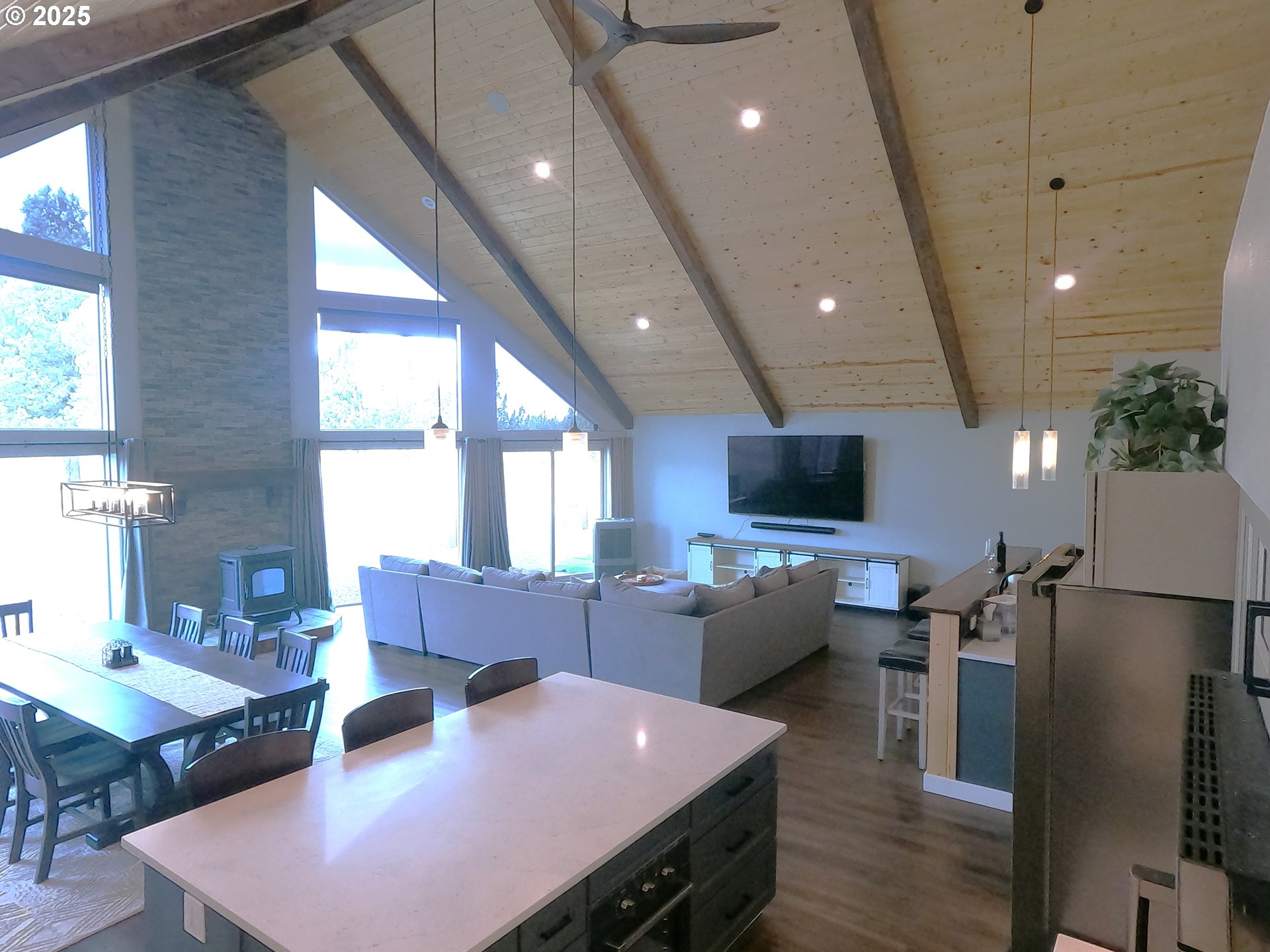 13422 Southwest Airfield Lane Culver, OR 97734 - Photo 12 of 42 a living room with lots of furniture and view of kitchen