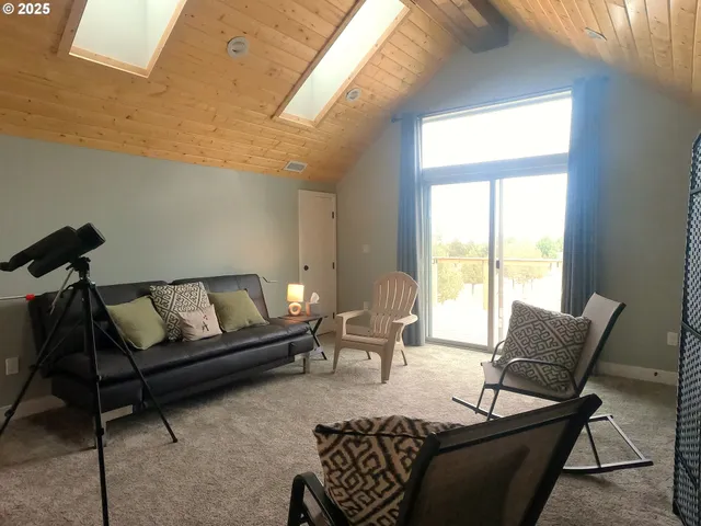 a view of roof deck with patio