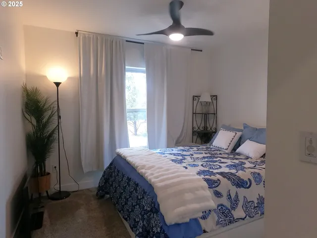 a view of a house with a yard and garage