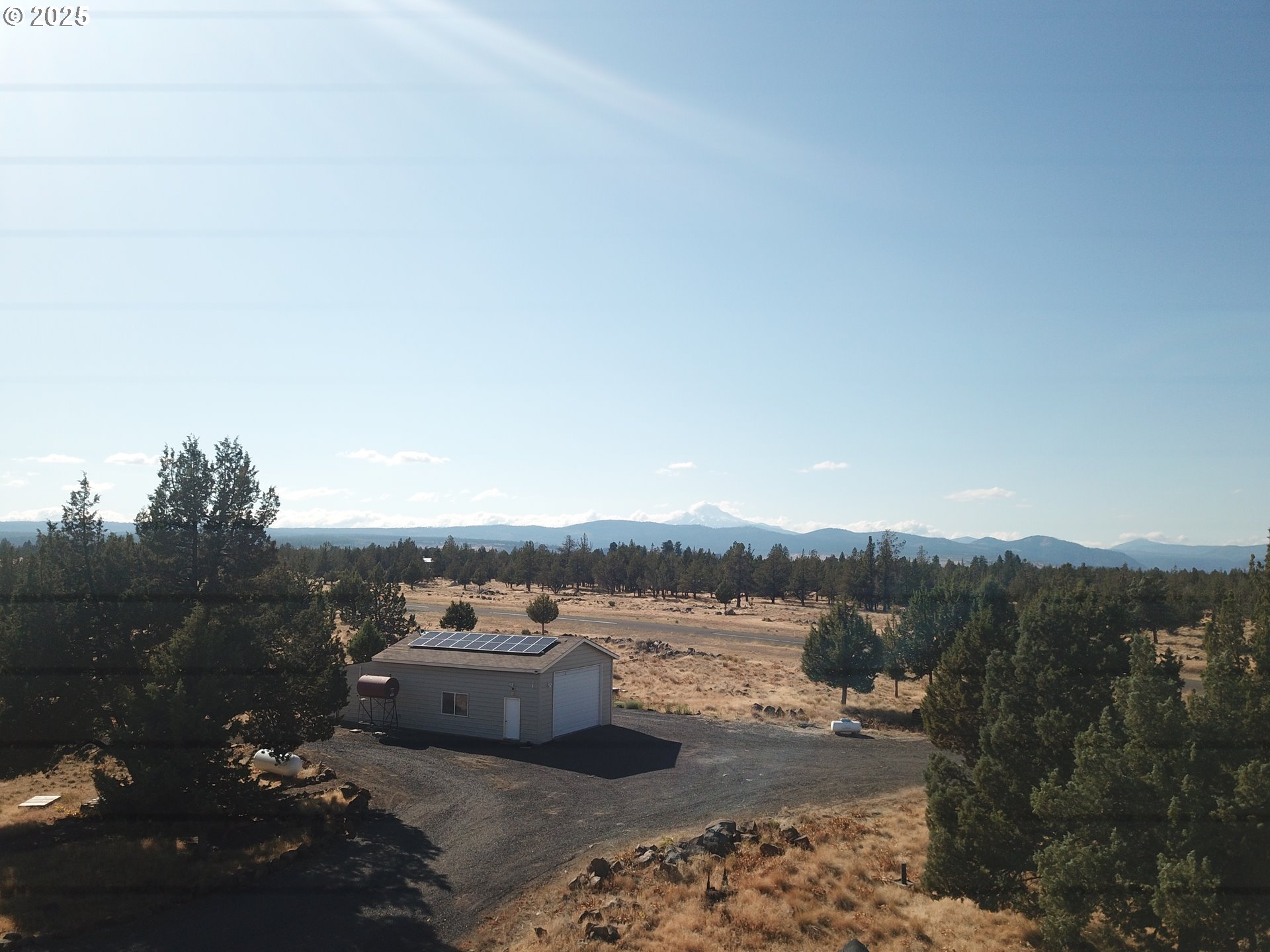13422 Southwest Airfield Lane Culver, OR 97734 - Photo 34 of 42 a view of a terrace with a bench