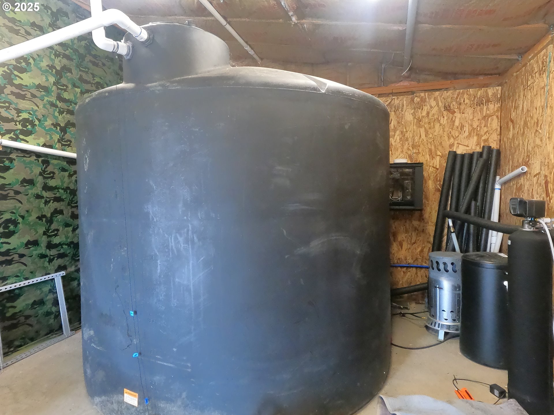 13422 Southwest Airfield Lane Culver, OR 97734 - Photo 38 of 42 a close view of water heater room