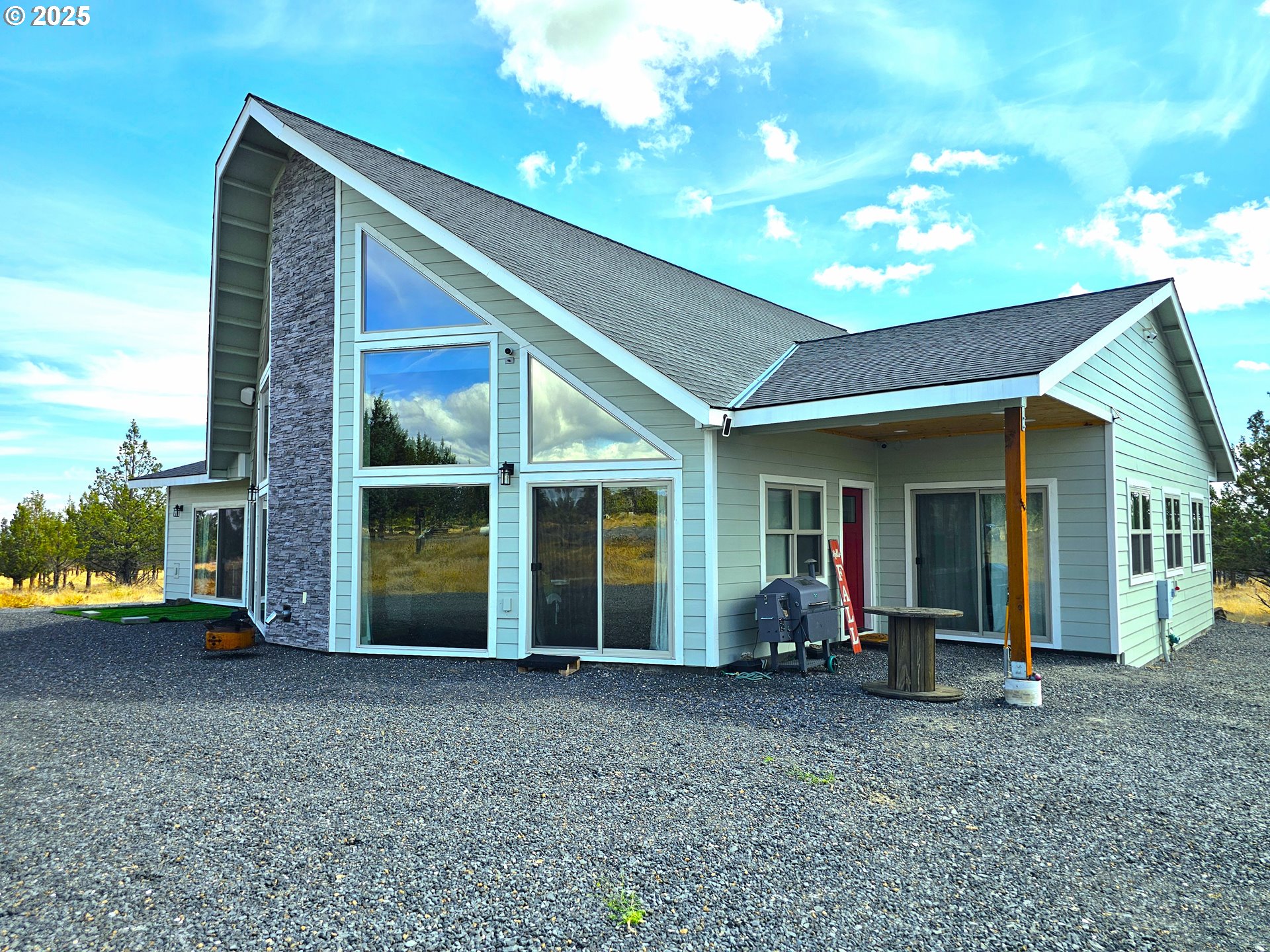 13422 Southwest Airfield Lane Culver, OR 97734 - Photo 4 of 42 a view of a house with porch