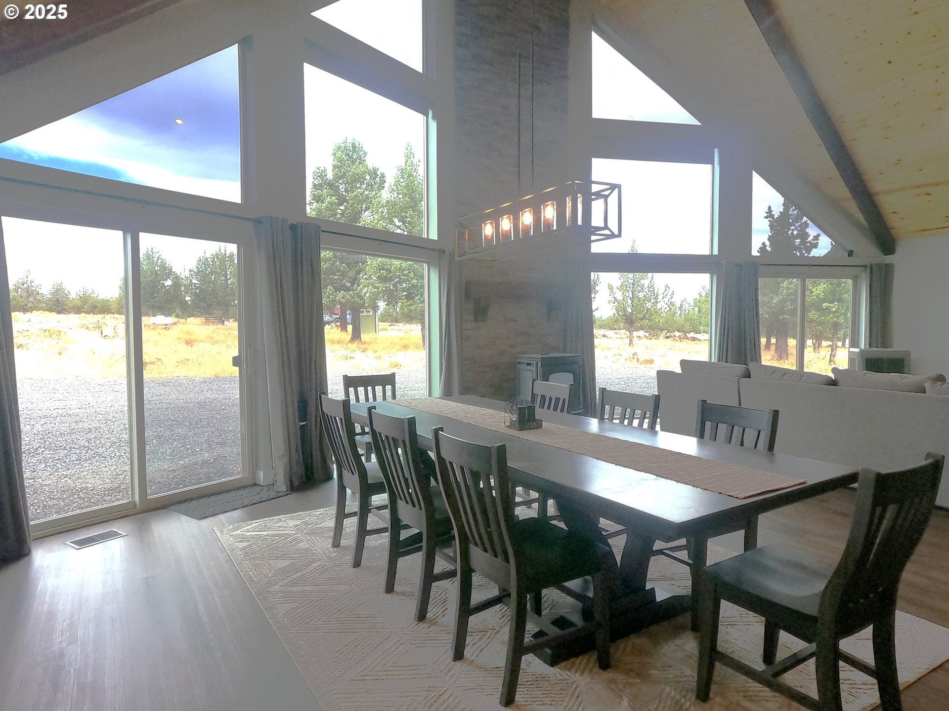 13422 Southwest Airfield Lane Culver, OR 97734 - Photo 9 of 42 a view of a dining room with furniture and window
