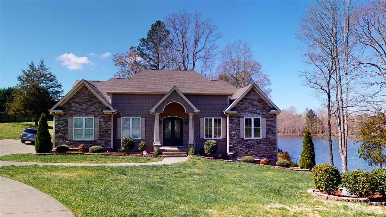3537 Saddle Ridge Road Stem, NC 27581 - Photo 1 of 29 a front view of house with yard and green space