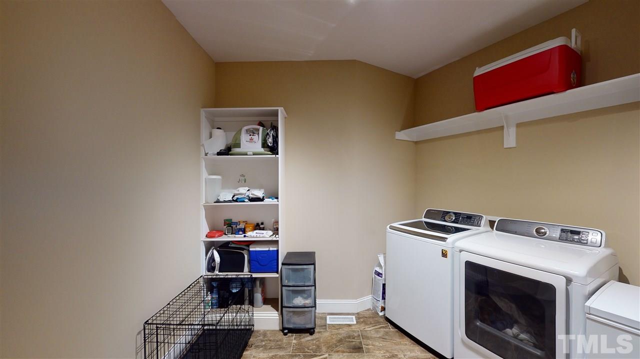 3537 Saddle Ridge Road Stem, NC 27581 - Photo 22 of 29 a room with storage and utility