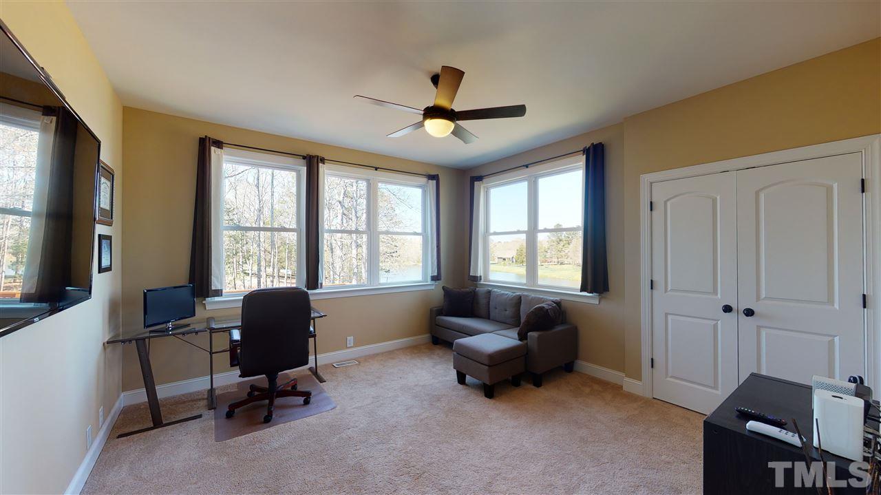 3537 Saddle Ridge Road Stem, NC 27581 - Photo 9 of 29 a living room with furniture and a window
