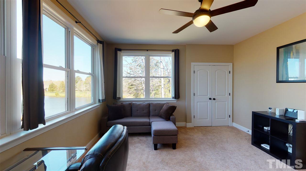 3537 Saddle Ridge Road Stem, NC 27581 - Photo 10 of 29 a living room with furniture and a window