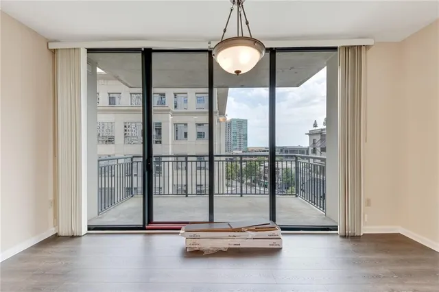 a view of room with floor to ceiling window