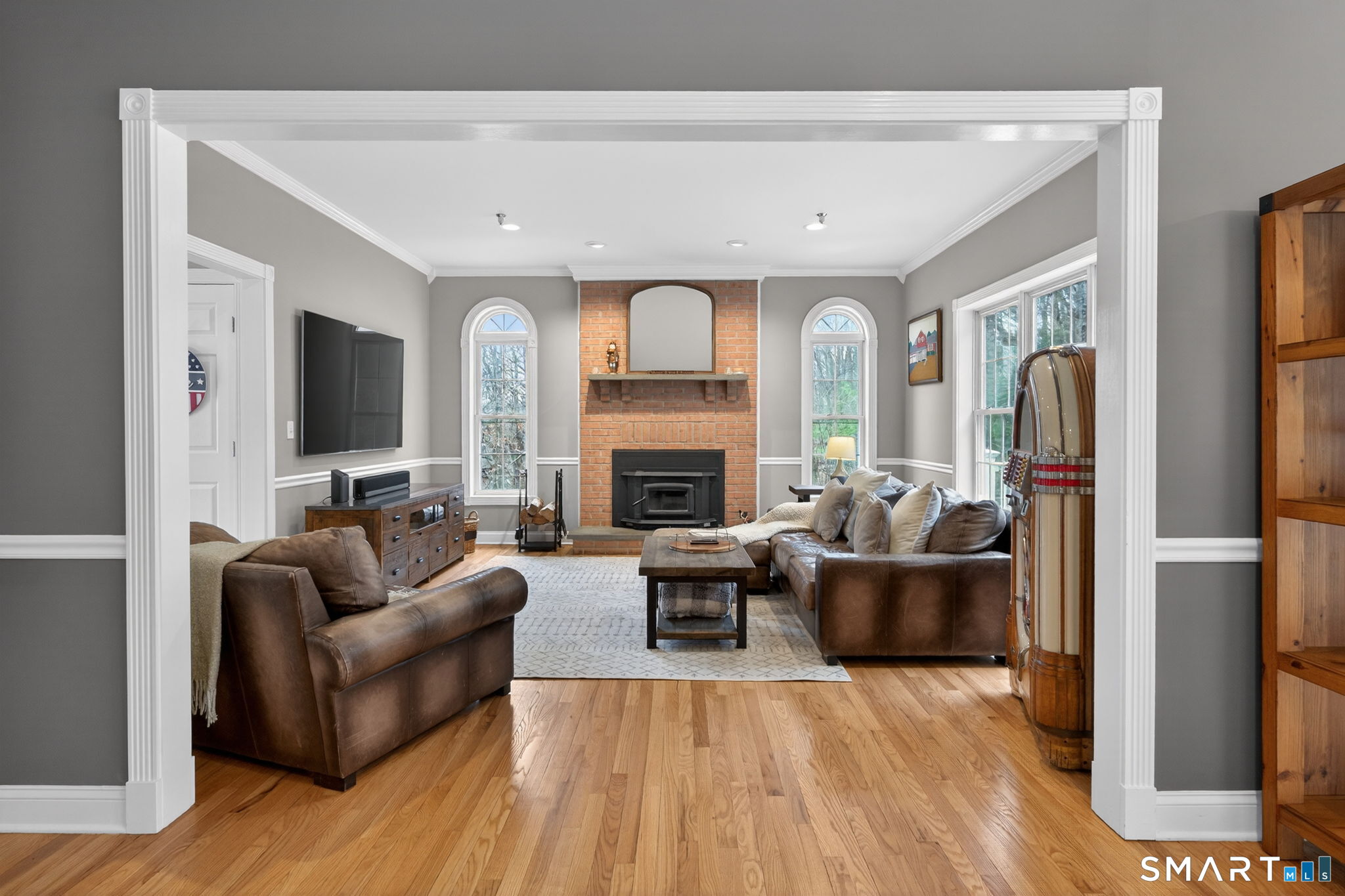 29 Boulder Ridge Southington, CT 06489 - Photo 15 of 40 a living room with furniture fireplace and a flat screen tv