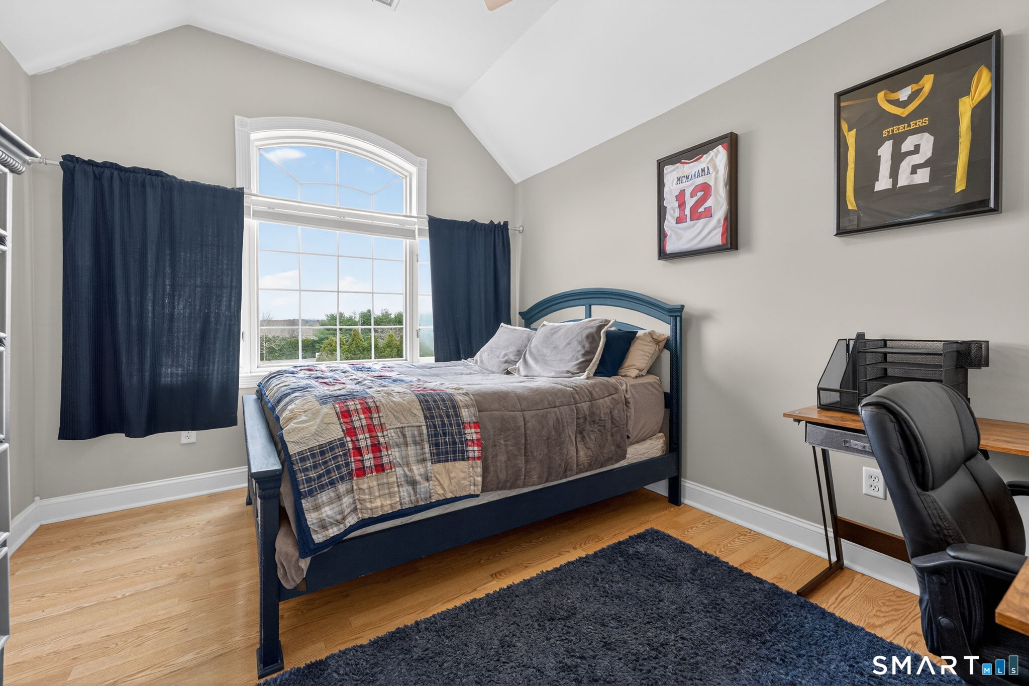 29 Boulder Ridge Southington, CT 06489 - Photo 22 of 40 a bedroom with a bed and wooden floor