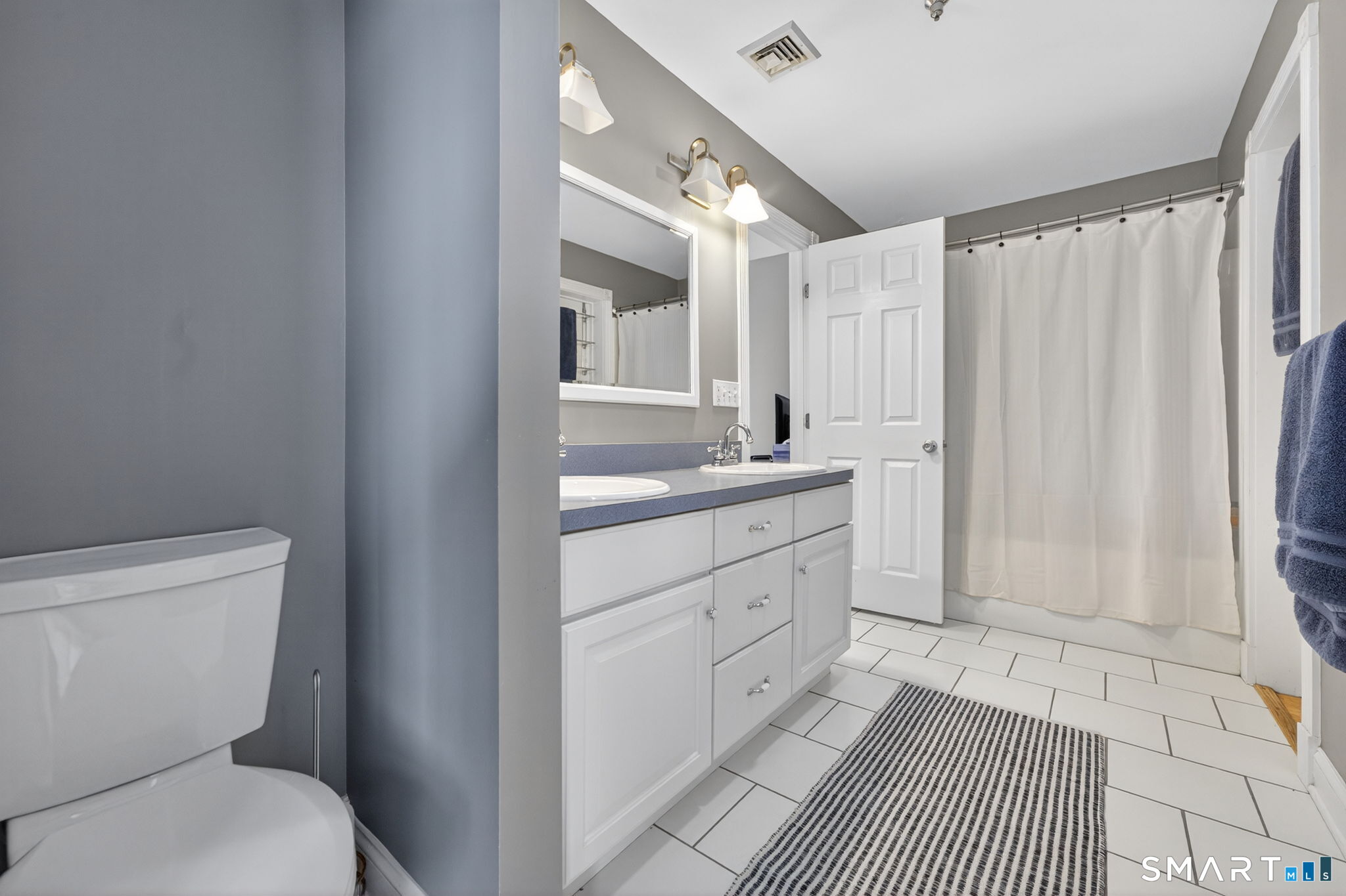 29 Boulder Ridge Southington, CT 06489 - Photo 24 of 40 a bathroom with a sink a toilet and shower