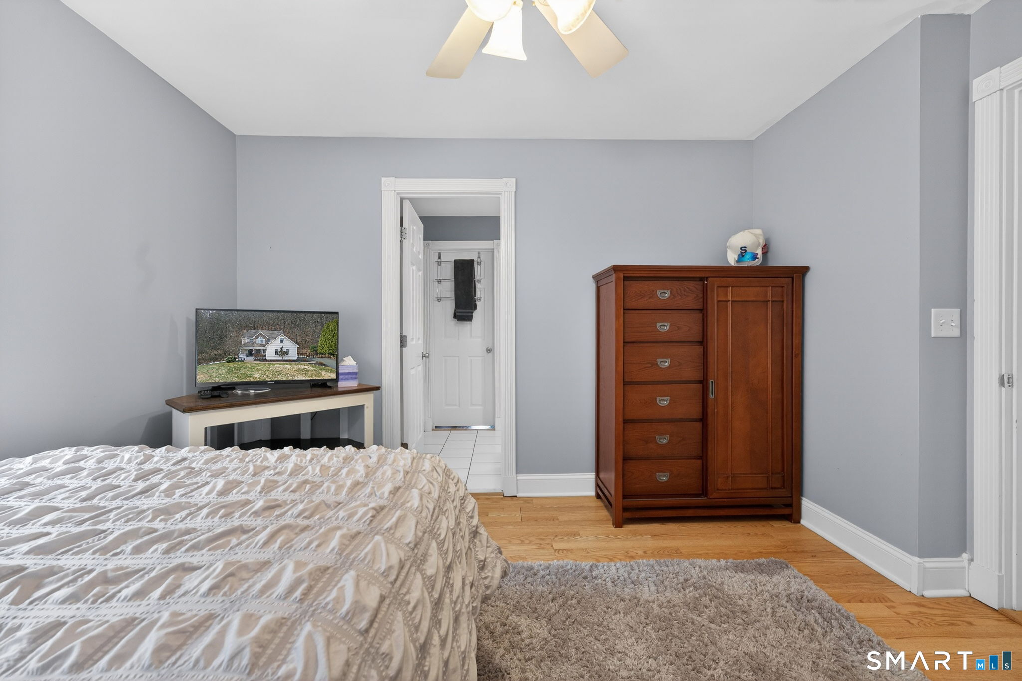 29 Boulder Ridge Southington, CT 06489 - Photo 27 of 40 a bedroom with a bed and a dresser