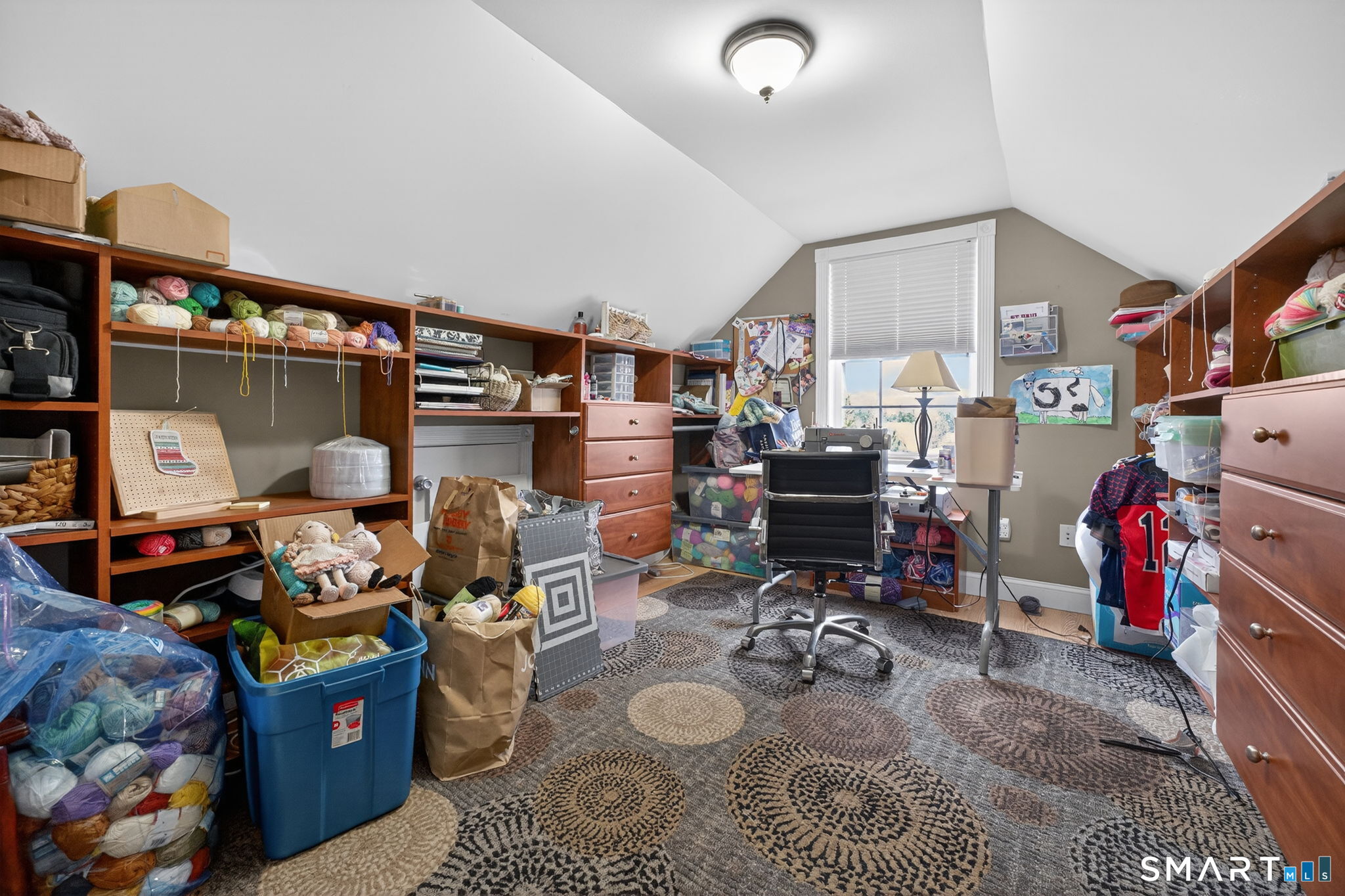 29 Boulder Ridge Southington, CT 06489 - Photo 28 of 40 a room with furniture and a gym machine