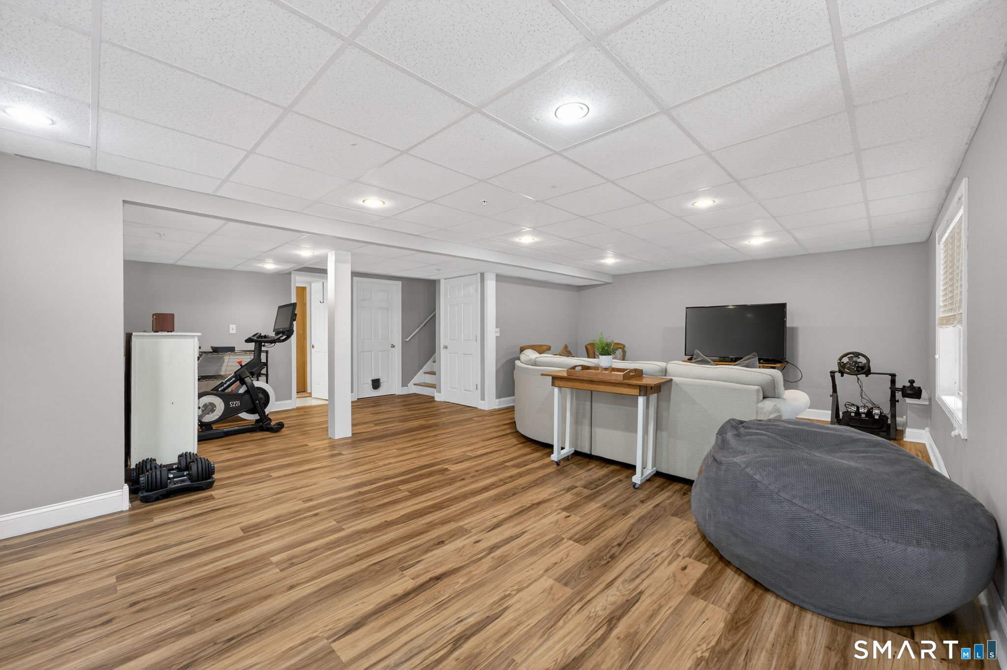 29 Boulder Ridge Southington, CT 06489 - Photo 30 of 40 a living room with furniture and a wooden floor