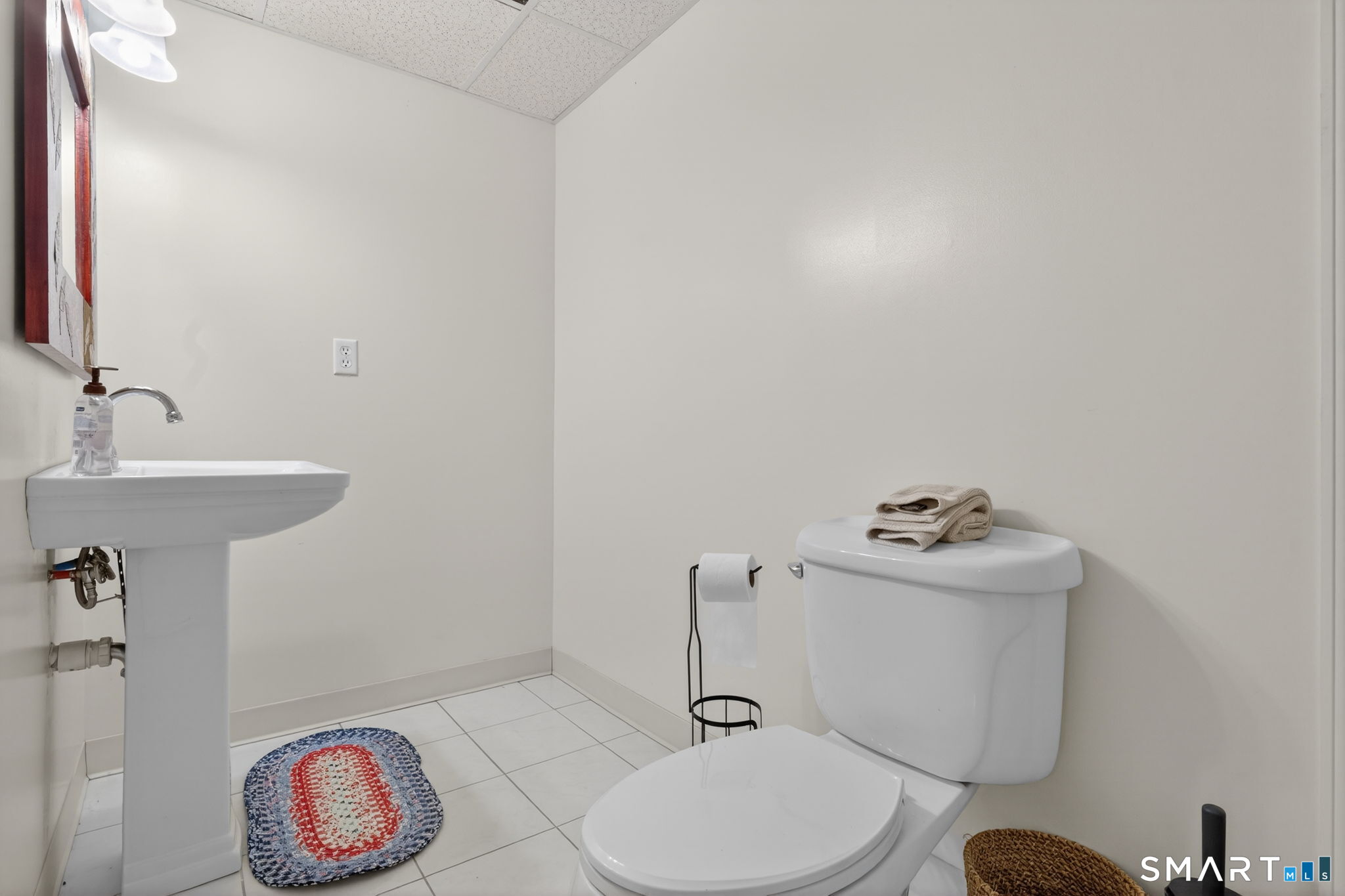 29 Boulder Ridge Southington, CT 06489 - Photo 31 of 40 a bathroom with a sink mirror and toilet