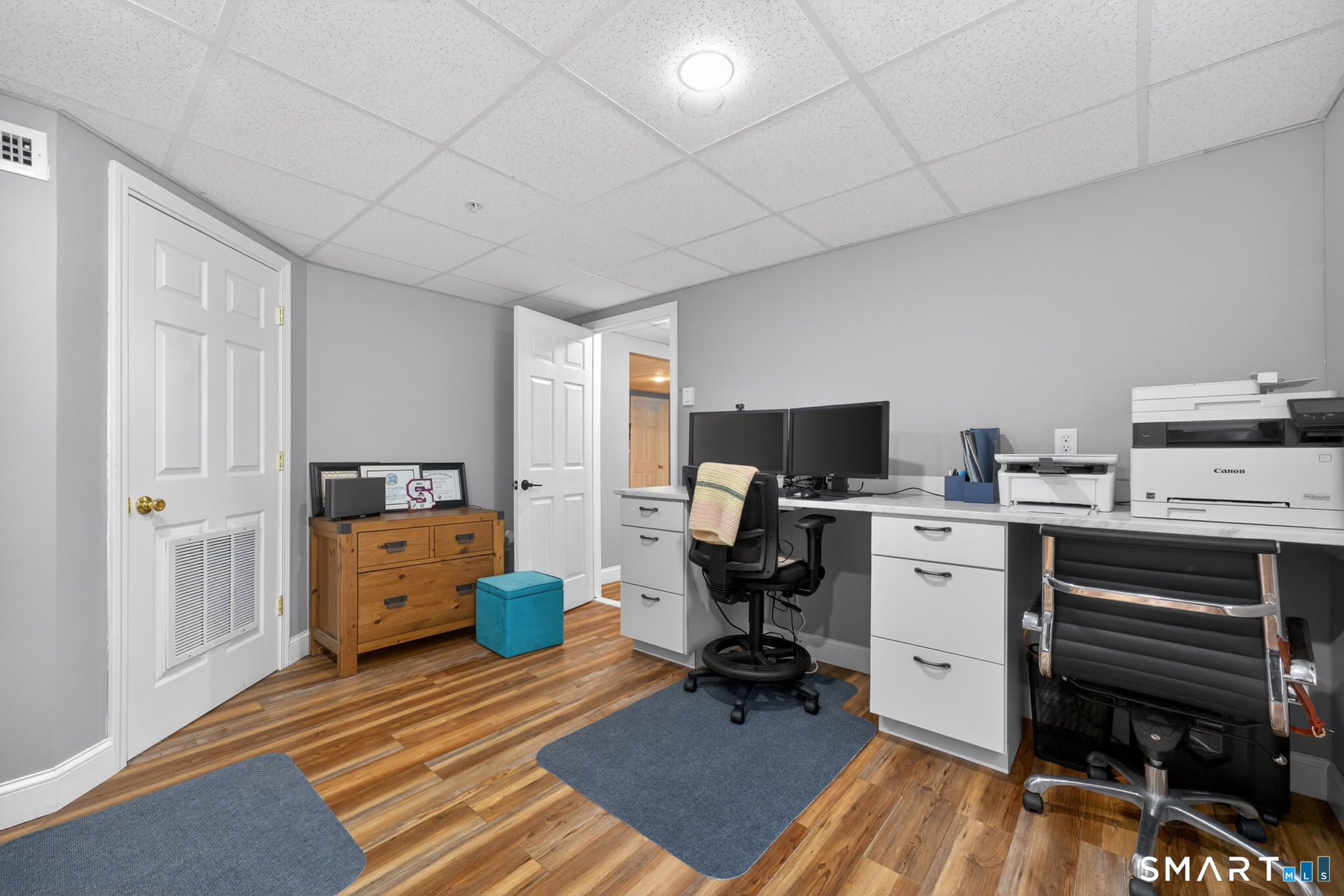 29 Boulder Ridge Southington, CT 06489 - Photo 34 of 40 a room with furniture a flat screen tv and a window