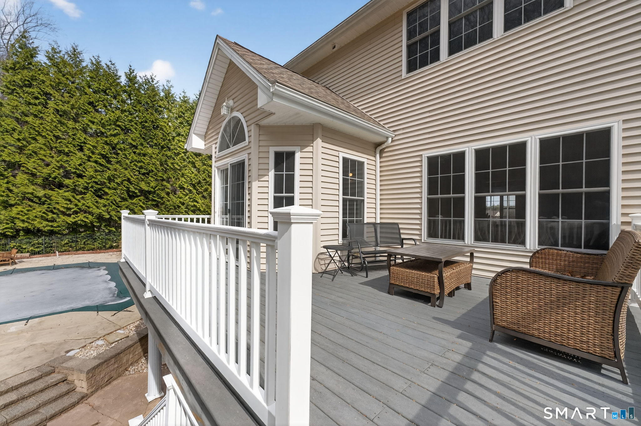 29 Boulder Ridge Southington, CT 06489 - Photo 35 of 40 a balcony with furniture and a window
