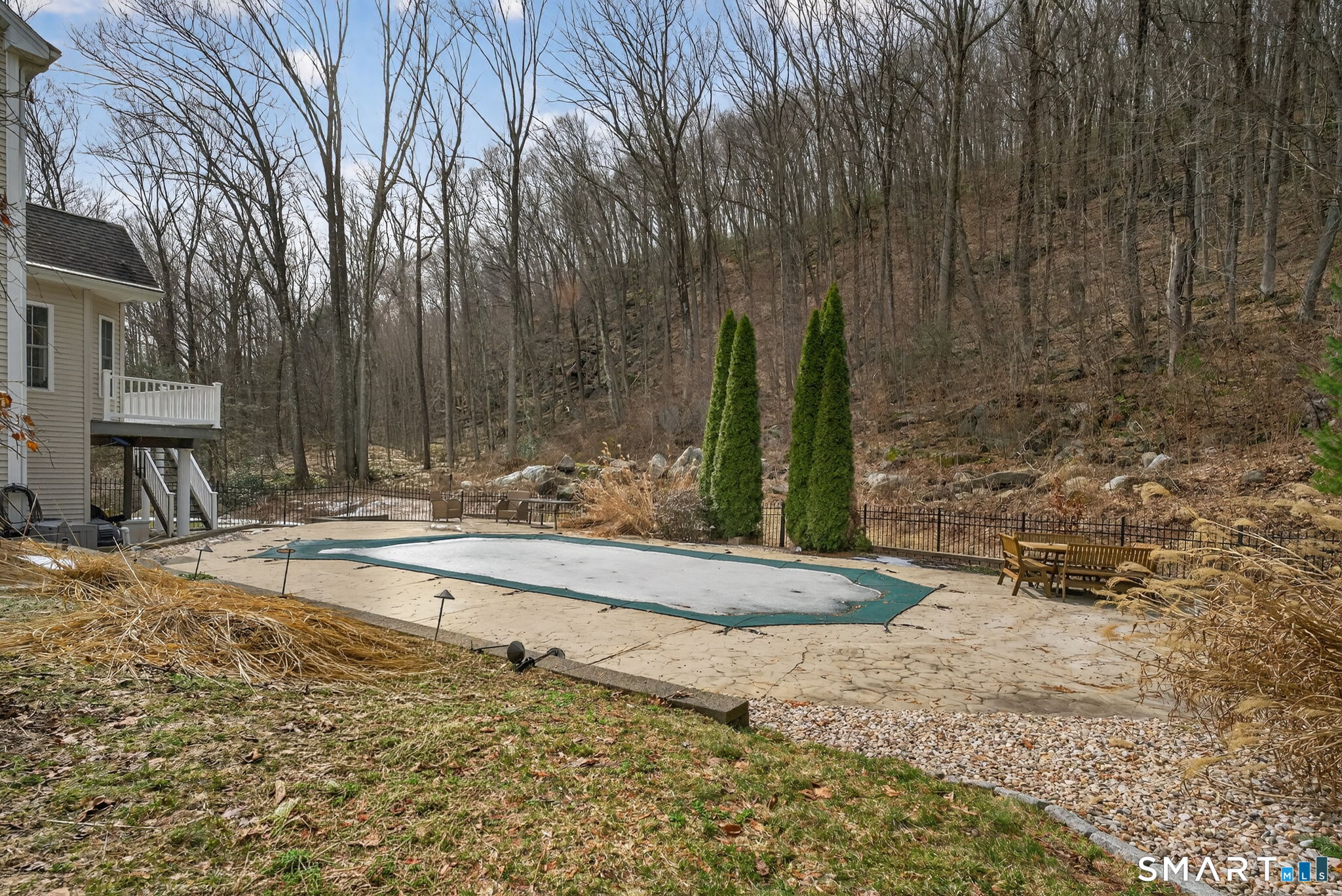 29 Boulder Ridge Southington, CT 06489 - Photo 38 of 40 a view of a backyard with large trees