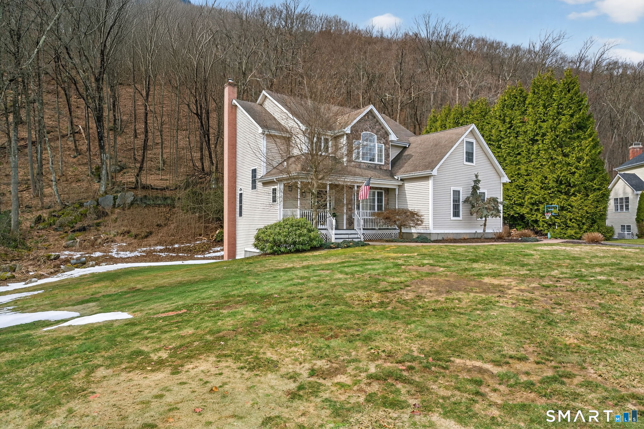 29 Boulder Ridge Southington, CT 06489 - Photo 4 of 40 a front view of a house with a yard