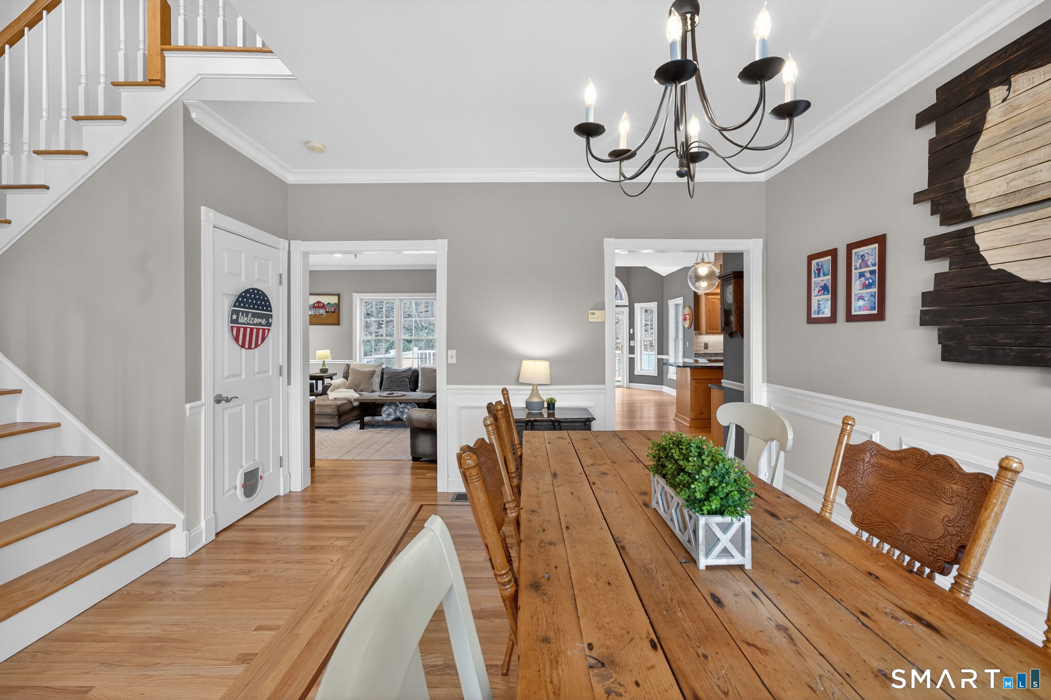 29 Boulder Ridge Southington, CT 06489 - Photo 5 of 40 a view of a livingroom with furniture and wooden floor