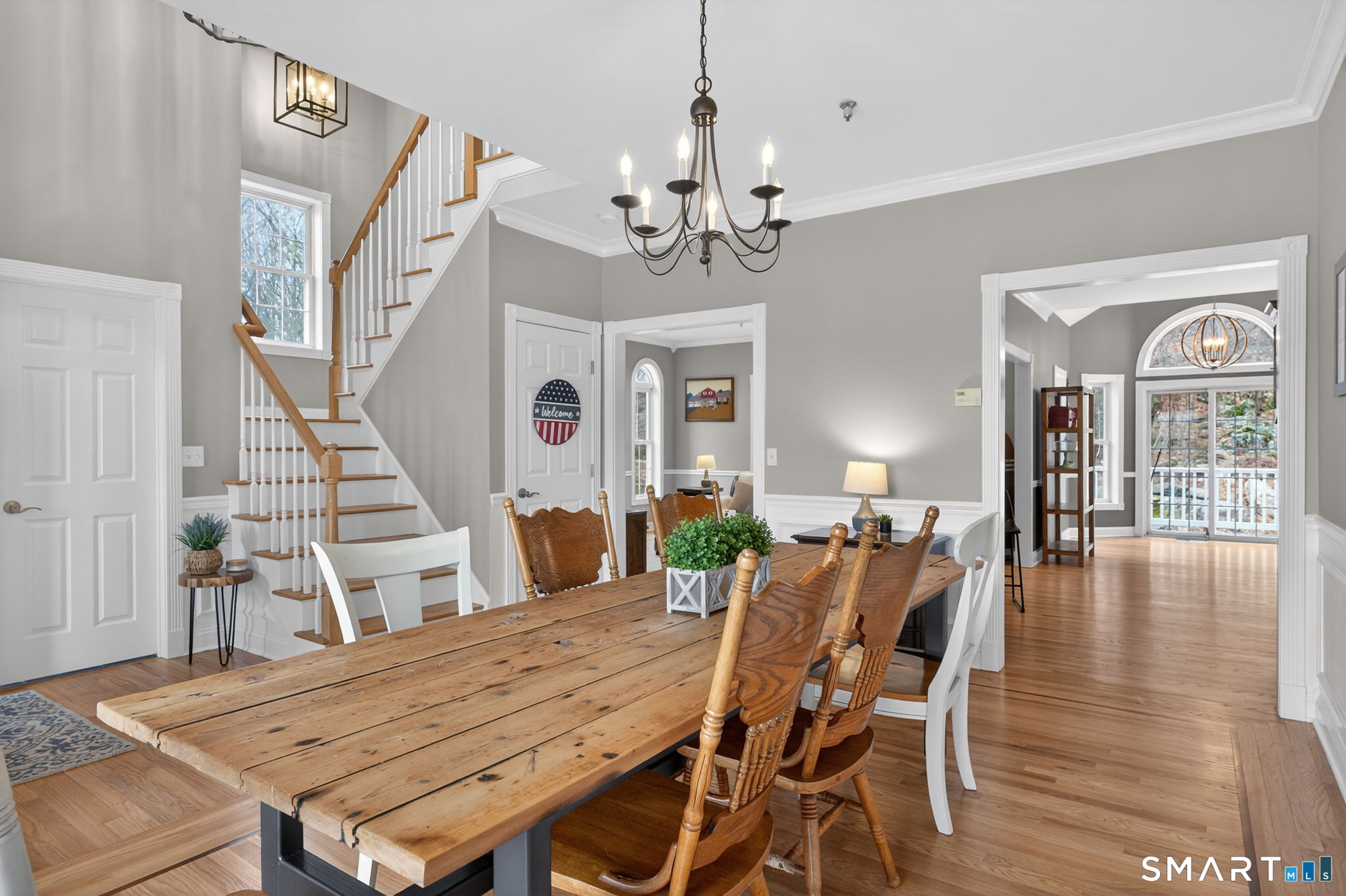 29 Boulder Ridge Southington, CT 06489 - Photo 7 of 40 a view of a dining room with furniture wooden floor and chandelier