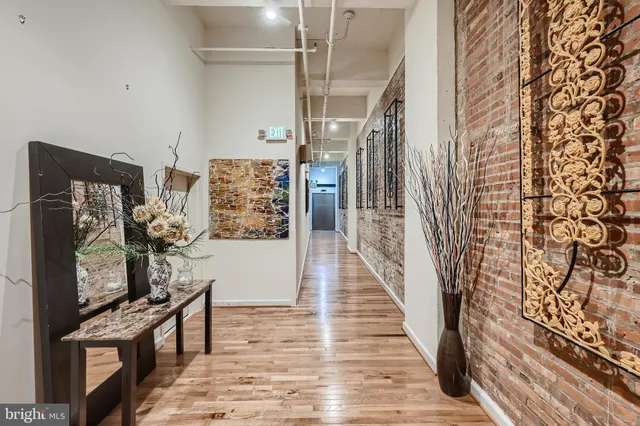 a view of entryway with wooden floor