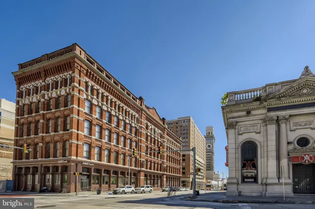 a view of a building with a street
