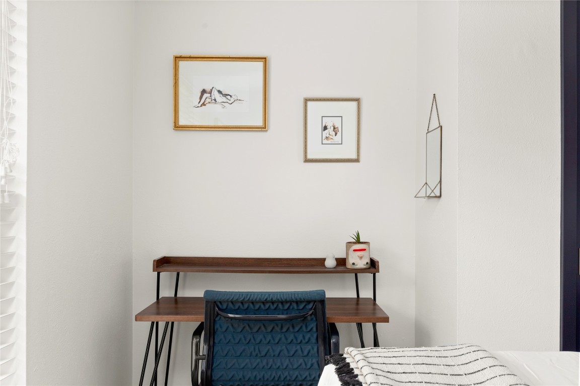 705 Battle Bend Boulevard Austin, TX 78745 - Photo 16 of 27 a bedroom with a bed and a desk