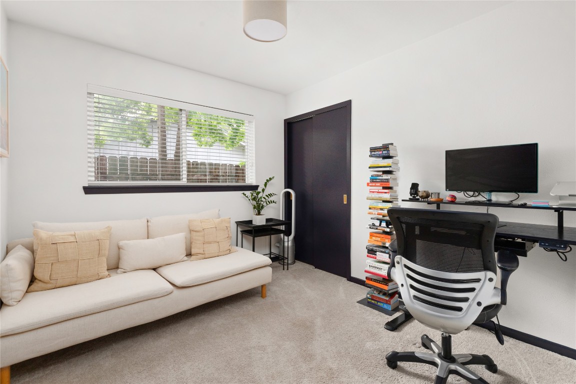 705 Battle Bend Boulevard Austin, TX 78745 - Photo 18 of 27 a living room with furniture and a flat screen tv