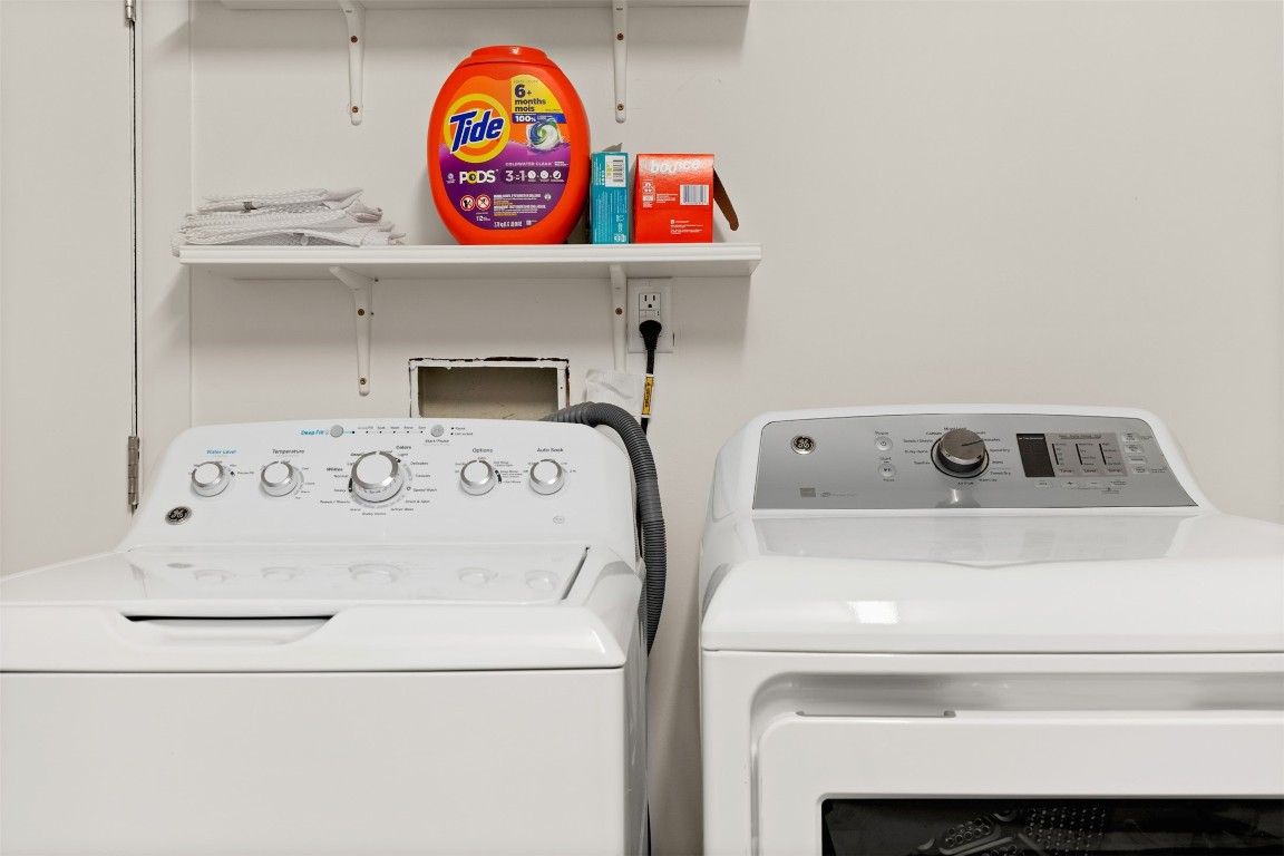 705 Battle Bend Boulevard Austin, TX 78745 - Photo 20 of 27 a utility room with washer and a sink