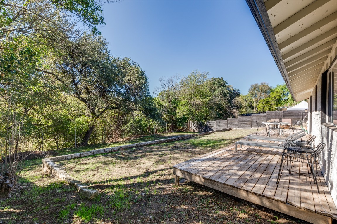 705 Battle Bend Boulevard Austin, TX 78745 - Photo 25 of 27 a view of a yard with wooden fence