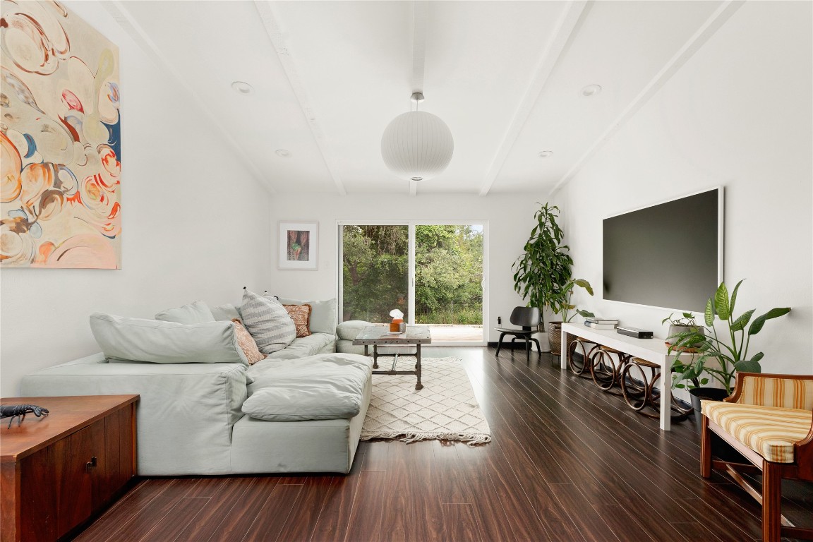 705 Battle Bend Boulevard Austin, TX 78745 - Photo 3 of 27 a living room with furniture and a flat screen tv