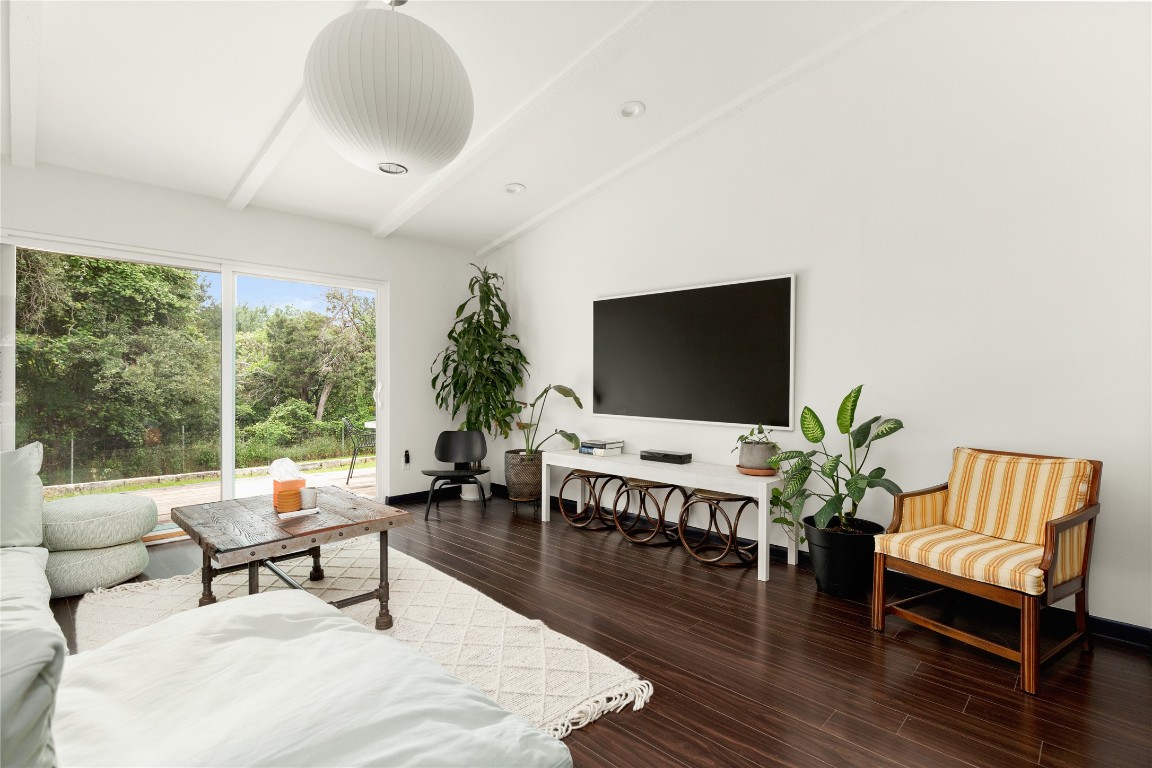 705 Battle Bend Boulevard Austin, TX 78745 - Photo 6 of 27 a living room with furniture and a flat screen tv