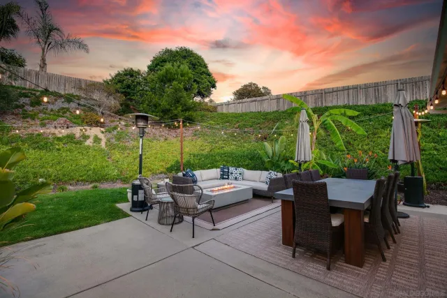 a view of a patio with swimming pool