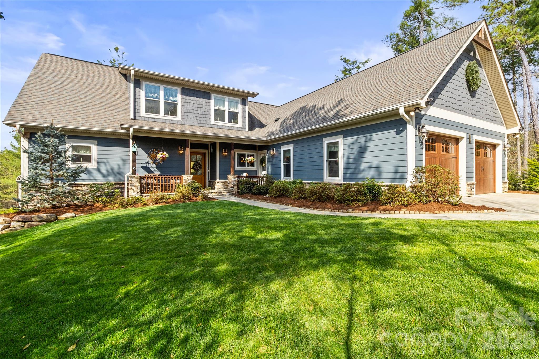 1103 River Ridge Way Lenoir, NC 28645 - Photo 2 of 46 a view of a house with a yard patio and a patio