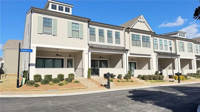 a front view of a house with a patio