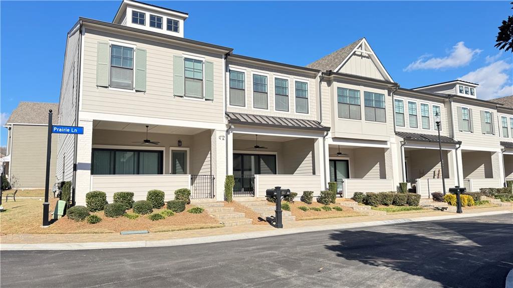 a front view of a house with a patio