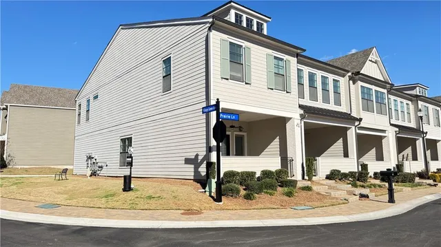 a front view of a house with street
