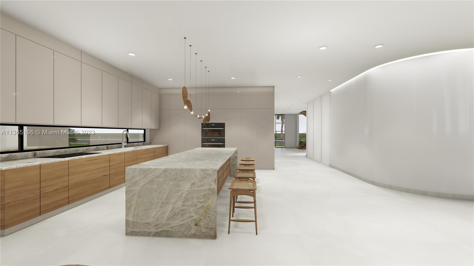 450 Southwest 21st Road Miami, FL 33129 - Photo 6 of 16 a kitchen with stainless steel appliances kitchen island granite countertop a refrigerator a stove and a sink with granite countertops