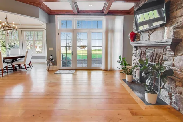 a room with furniture and a mirror