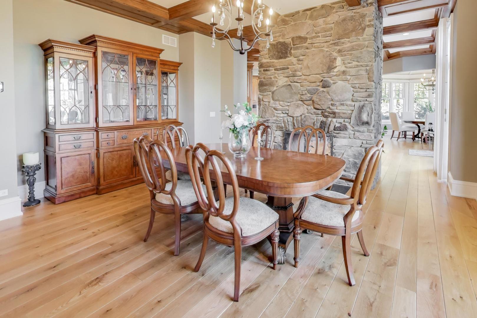 347 Bluffs Edge Drive Lake Forest, IL 60045 - Photo 23 of 79 a dining room with furniture and wooden floor